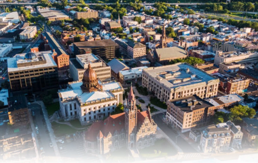 An aerial view of Passaic, New Jersey, showcasing the local neighborhoods and surrounding landscape.