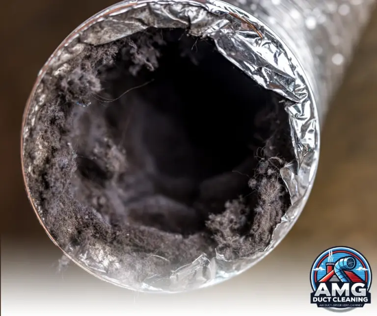 Close-Up of Clogged Dryer Vent – "Close-up image of a clogged dryer vent full of lint, highlighting the importance of regular cleaning to prevent fires."